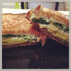 grilled cheese with pesto, mozz, goat cheese, avocado, & spinach